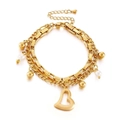 Double-layered gold bracelet with hollow heart pendant and white pearls on white background - Gold Color (KB144910-Z)
