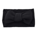 Elastic nylon baby headband featuring a large black textured knot bow decoration - Black