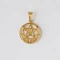 Macro shot of gold-plated celestial pendant featuring a star and crescent moon design - Z11 Round Moon Star