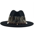 Black wool fedora with bohemian feather trim and ethnic beaded charms on white background - Black
