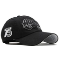 Black cotton baseball cap with white Always 75 embroidery and curved brim in side view - Black