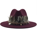 Detail of burgundy wool fedora with bohemian feather trim and ethnic beaded charms - Burgundy
