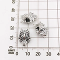 Silver wolf head spacer beads for DIY jewelry making on millimeter scale grid - Antique Silver Wolf Head