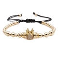 Detail of adjustable black woven bracelet with golden crown and sparkling crystal beads - Crown Bracelet / Gold