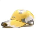 Detailed close-up of the breathable eyelets and tie-dye cotton fabric on the baseball cap - Adjustable / Yellow Gray