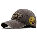 Detailed macro view of 3ET vintage washed cotton baseball cap with retro side badge - Adjustable / Coffee