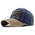 Detail der verwaschenen Vintage-Baseballkappe mit Skelett-Stickerei und khakifarbenem Schirm - Verstellbar / Marineblau