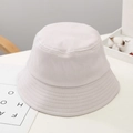 Detail view of cream cotton bucket hat featuring clean stitching and minimalist design - 52cm (2-6 Years) / Beige