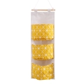 Hanging cotton linen organizer with three pockets in yellow star pattern and wooden bar - Yellow Branches