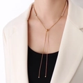 French style 18k gold plated Y-necklace with cubic zirconia crystals on female model - Gold Necklace (68cm) / Length 68cm/Y-Shaped Adjustable / Gold