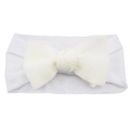 White ribbed knit baby headband with a large decorative bow on a clean background - Cream