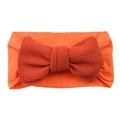 Orange baby headband featuring a large textured knitted bow on a soft fabric strap - Vintage Orange