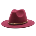 Macro shot of the wine red wool fedora hat with brown leather band and skull accent - M (55-58cm) / Burgundy