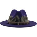 Detailed close-up of a purple felt fedora hat featuring ethnic bands and natural feathers - Purple