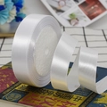 Roll of 2cm wide white satin ribbon with smooth glossy finish for gift packaging - White