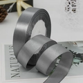 Deep grey satin ribbon roll for gift wrapping and wedding decorations with smooth finish - Gray