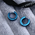 Minimalist matte blue titanium steel hoop earrings displayed on grey plush fabric - Polished (Single Piece) / Blue