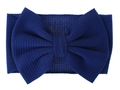 Close-up of navy blue waffle knit baby headband with a large oversized bow detail - Sapphire Blue