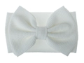 Detail of white waffle knit baby headband featuring an oversized fabric bow design - White