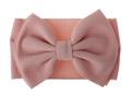 Detailed close-up of pink baby headband with large bow and elastic honeycomb texture - Pink