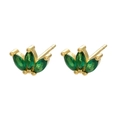 Macro detail of gold earrings featuring marquise green stones in a crown arrangement - Gold Three-Stone Crown