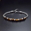 Close-up of 6mm tiger eye stone beads and stainless steel chain links with lobster clasp - Yellow Tiger Eye 6mm Stainless Steel