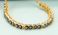 Bracciale occhio greco dorato regolabile con ciondoli smaltati colorati per donna - Nero