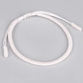 Detail of hand-woven white knot bracelet with intricate textile texture and adjustable cord - White