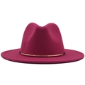 Detail of magenta wool fedora hat featuring a decorative gold metallic band accessory - Rose Red