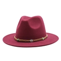 Detail of burgundy fedora hat with braided rope band and green beads on white background - Burgundy