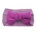 Infant nylon headband with large purple textured fabric bow on a clean white background - Purple