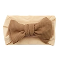 Infant headband with a large brown fabric bow and a soft nude textured nylon strap - Camel