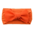 Infant nylon headband with large orange waffle texture bow, baby hair accessory - Orange