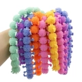 Colorful TPR caterpillar fidget toys with soft spikes shown in a group for sensory play - Caterpillar Stretch Toy