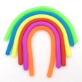 Set of seven colorful TPR elastic stretch tubes for stress relief in rainbow colors - Small Noodle (19cm)