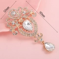Golden sunburst pendant with pear-shaped rhinestones and crystal pearls, 50x90mm size - Gold Clear Teardrop