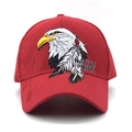 Detailed view of native pride eagle head embroidery on red cotton baseball cap - Adjustable / Red