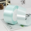 Roll of 4cm light mint green satin ribbon with a smooth silk finish for gift wrapping - 4cm x 22m / Light Tiffany Blue