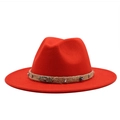 Detail of red wool felt fedora featuring a scorpion metal buckle and braided rope band - Orange Red