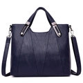 Navy blue faux leather tote bag with V-shaped stitching and adjustable shoulder strap - Blue