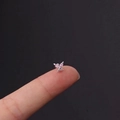 Pink zircon butterfly stud earring in stainless steel finish shown on a fingertip - Pink Butterfly Style (4#S) / Silver