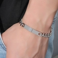Silver stainless steel Cuban link bracelet with rectangular ID plate on wrist - Male Style