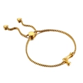 Gold stainless steel box chain bracelet featuring a bone pendant and heart accents - Letter L (KB123979-KFC)