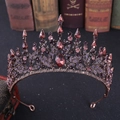 Detailed close-up of Baroque bridal crown with red gems and bronze leaf patterns - Antique Red Copper with Purple Rhinestones