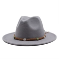 Detail of grey wool fedora hat featuring a brown braided band with green beads and silver buckle - Light Gray