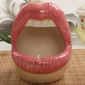 Pink ceramic lip-shaped ashtray for living room decor on a natural bamboo mat - Style B / Pink