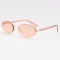 Retro rimless oval sunglasses with light orange lenses and gold metal accents - Champagne Frame Champagne Lens