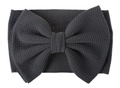 Detail of dark grey waffle knit baby headband with oversized textured bow design - Dark Gray