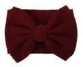 Detail showing waffle weave texture on a large burgundy bow headband for infants - Burgundy
