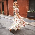 Floral print maxi dress in white with long sleeves and brown belt for a boho style - S / White